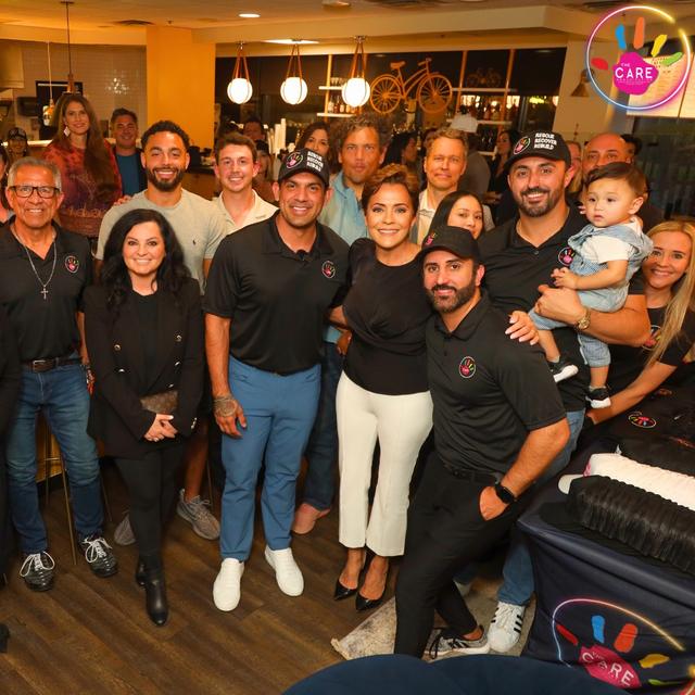 The CARE team and volunteers gathered together at an event